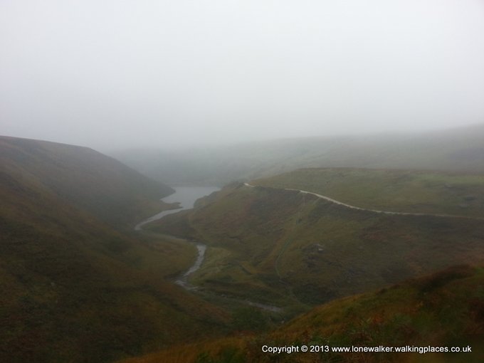 Looking back to Blakely Reservoir through the rain and mist