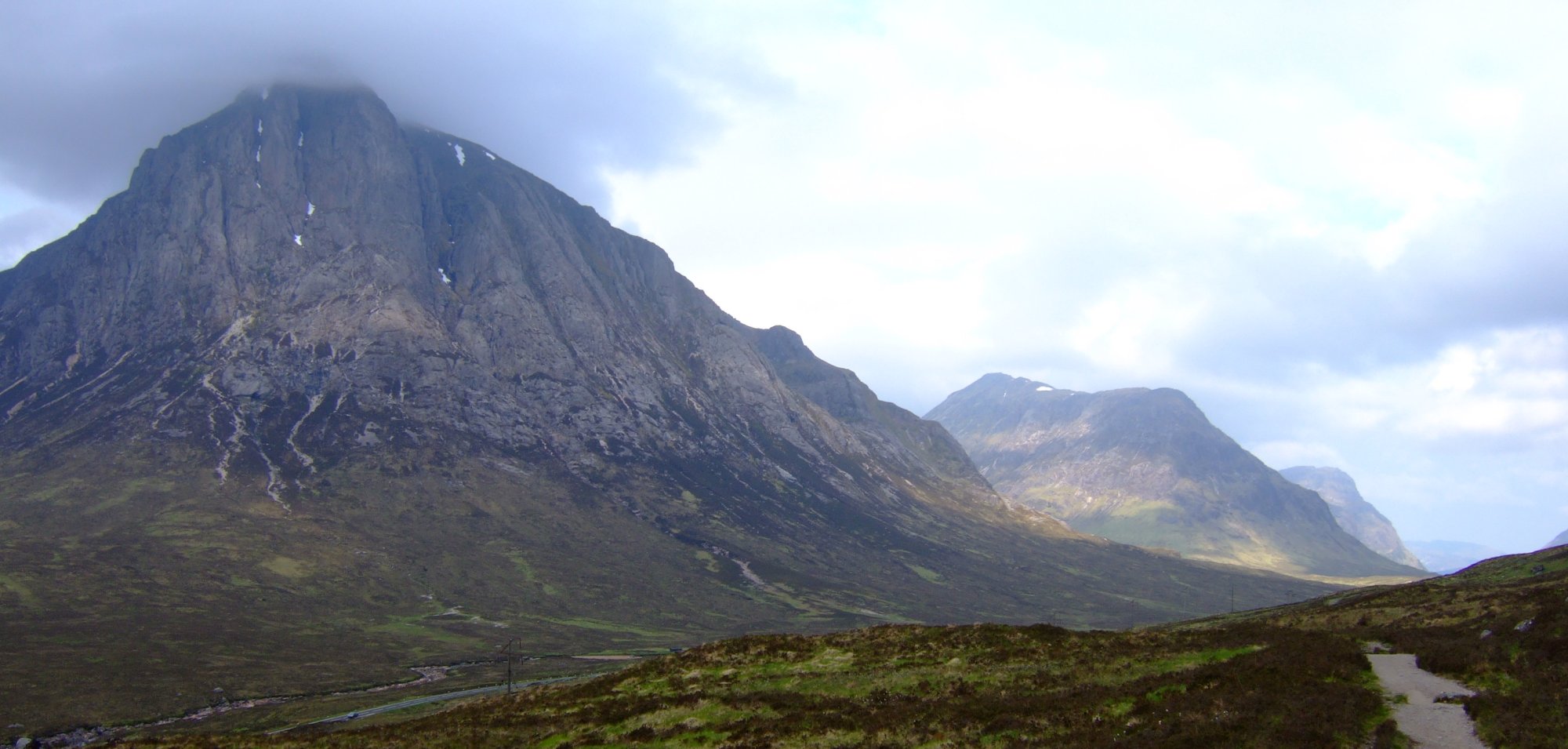 Buachaille Etive Mor with Buachaille Etive Beag beyond and the first of the Three Sisters, Beinn Fhada, in the distance