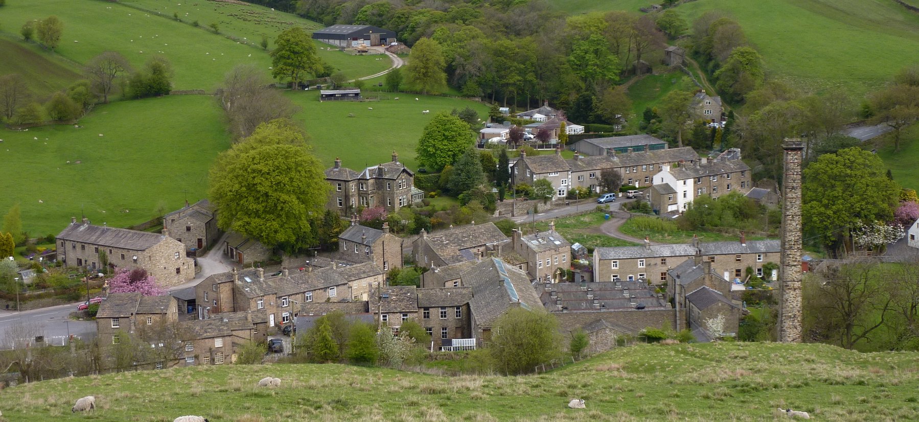 Dropping into Lothersdale with its tall chimney