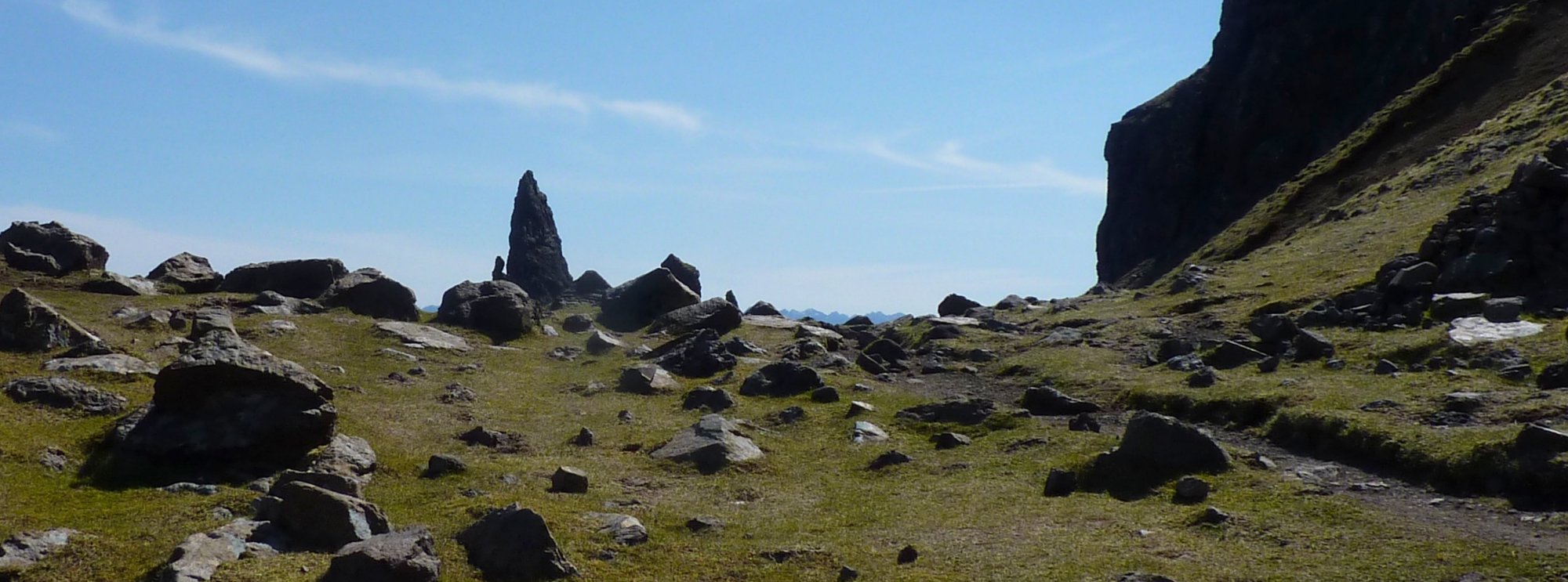An unusual view of the Old Man of Storr - just the tip sticking out from the skyline ahead