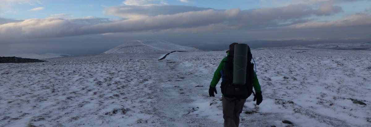 Heading for Pen-y-Ghent, across the frozen peat hagg
